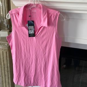 Addidas women’s golf top. Brand new with original tags.